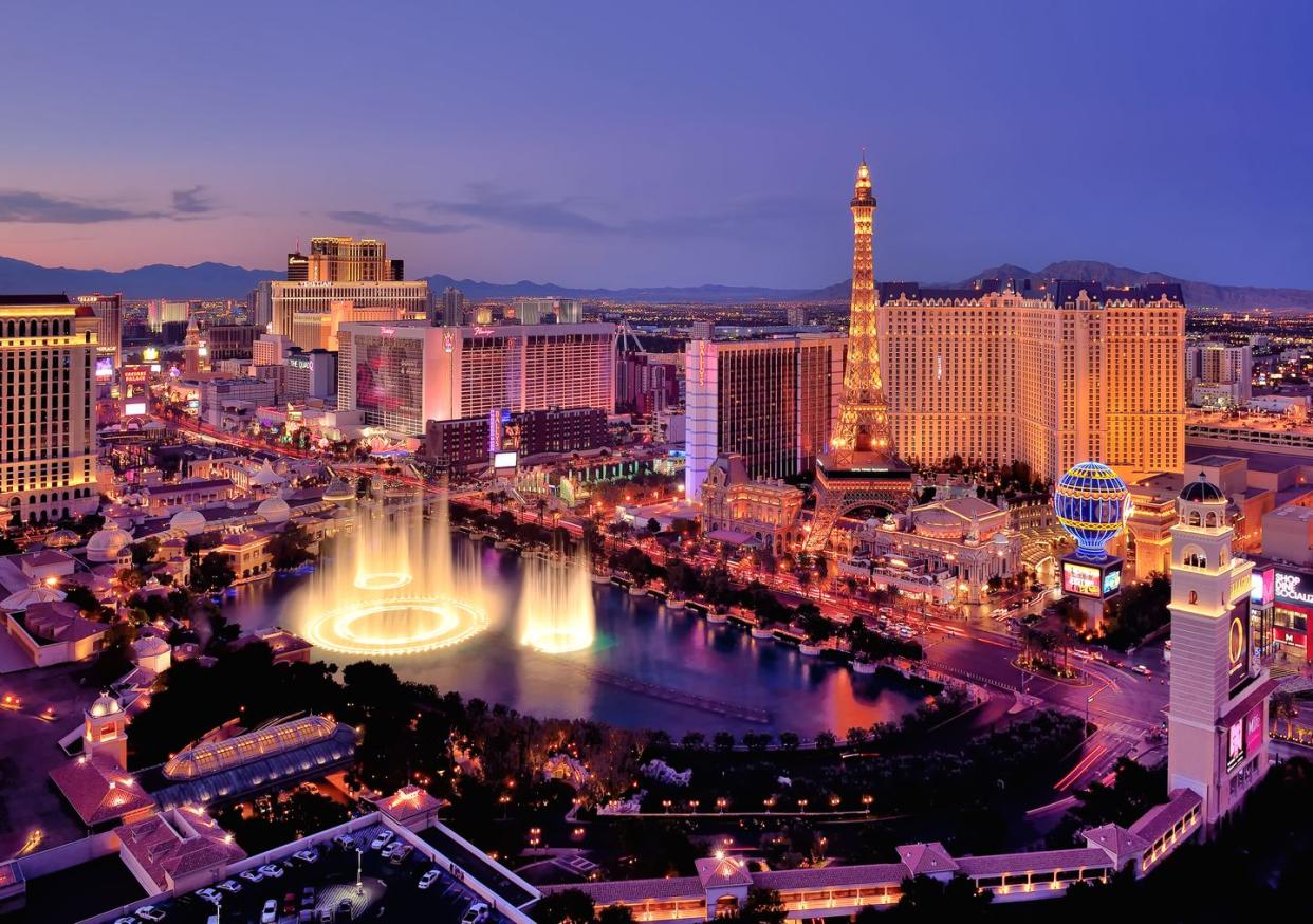 city skyline at night with bellagio hotel water fountains, las vegas, nevada, america, usa