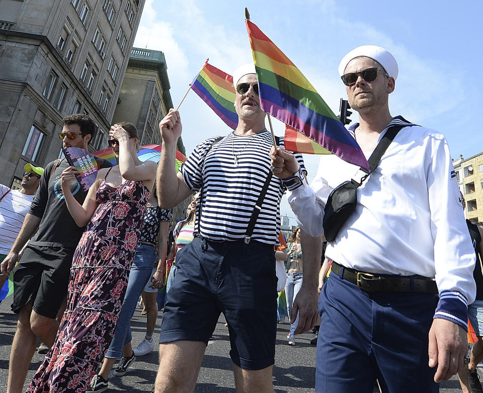 People take part in a gay pride parade in Warsaw, Poland, Saturday, June 8, 2019. The Equality Parade is the largest gay pride parade in central and Eastern Europe. It brought thousands of people to the streets of Warsaw at a time when the LGBT rights movement in Poland is targeted by hate speeches and a government campaign depicting it as a threat to families and society. (AP Photo/Czarek Sokolowski)