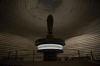 The Dead Sea Scrolls at the Shrine of the Book are on display in the Israel Museum, during final preparations during final preparations to reopen following five months of closure due to the coronavirus pandemic, in Jerusalem, Tuesday, Aug. 11, 2020. The Israel Museum, the country's largest cultural institution, is returning the priceless Dead Sea scrolls and other treasured artworks to its galleries ahead of this week's reopening to the public. (AP Photo/Maya Alleruzzo)