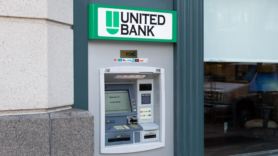 WASHINGTON, DC, USA - December 12, 2019: United Bank ATM on street level outside a bank branch in Washington, D.