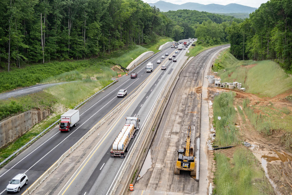 Workers have been closing one side of the former interstate and directing all traffic onto the other side to facilitate the widening. Crews remove the old pavement, widen the base and then lay down new concrete.