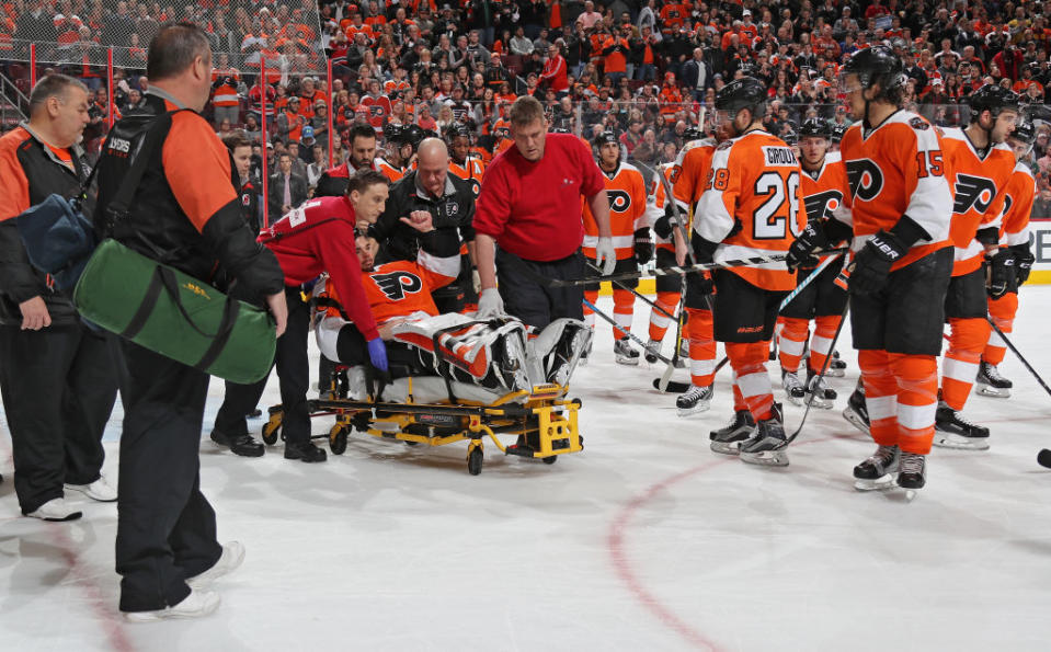 PHILADELPHIA, PA – APRIL 01: Michal Neuvirth #30 of the Philadelphia Flyers gives the “thumbs up” sign as he’s taken off the ice on a stretcher after collapsing in the first period against the New Jersey Devils on April 1, 2017 at the Wells Fargo Center in Philadelphia, Pennsylvania. (Photo by Len Redkoles/NHLI via Getty Images)