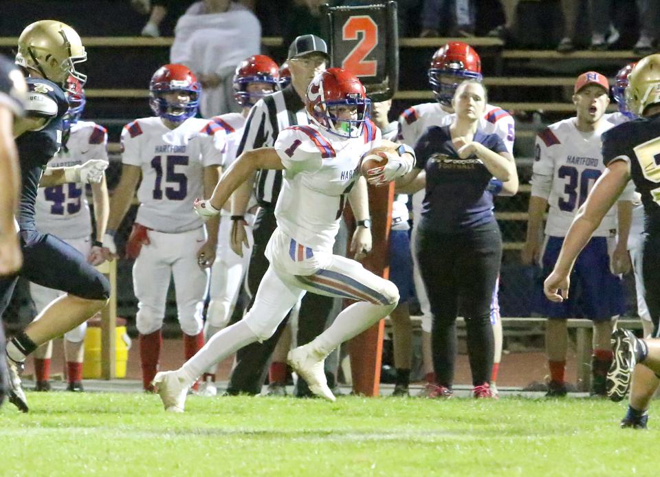 Hartford's Ezra Mock streaks down the sideline during the Hurricanes 30-21 win over Essex on Friday night at EHS.