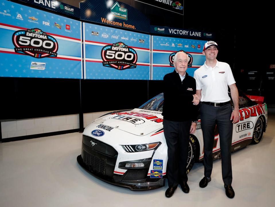 Roger Penske and Austin Cindric during the winning Daytona 500 car induction at the Motorsports Hall of Fame at Daytona International Speedway, Tuesday, March 8, 2022.