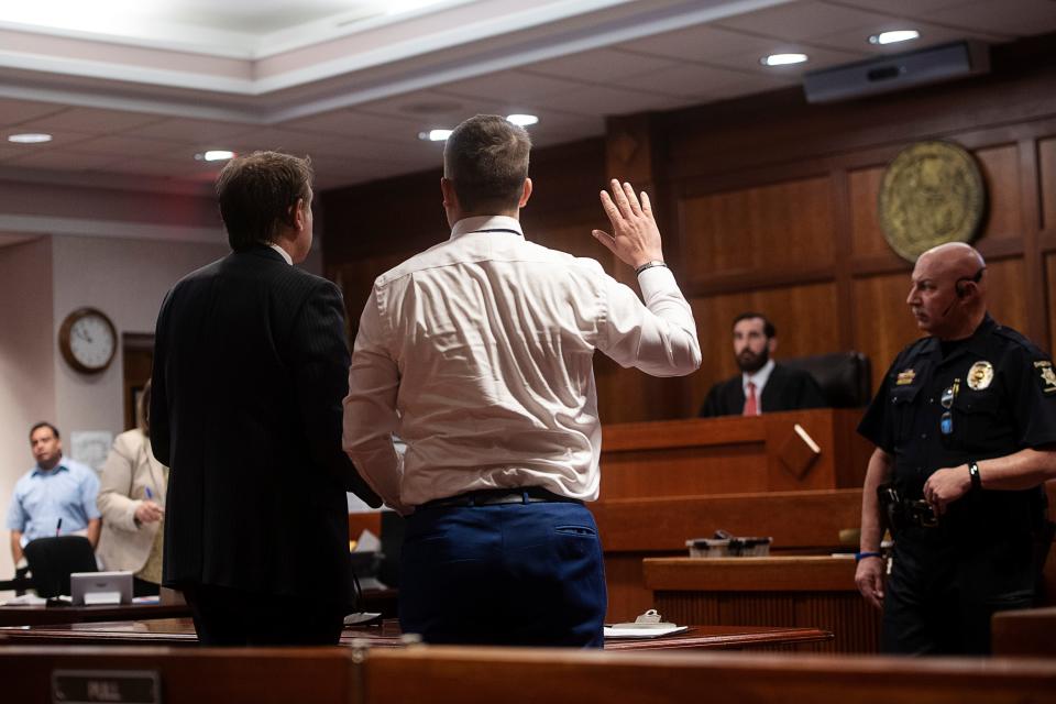 Former Henderson County Sheriff's deputy Joshua Rankin, who is charged with shooting a 25-year-old man with autism while off duty Feb. 23, appeared in Henderson County District Court Feb. 26 with his hired private attorney, Douglas Pearson.