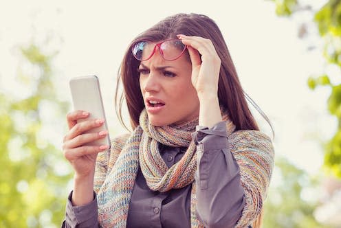 <span class="caption">Privacy law doesn't do much to protect you from being photographed in public, but there are nuances.</span> <span class="attribution"><a class="link " href="https://www.shutterstock.com/image-photo/annoyed-upset-woman-glasses-looking-her-766125772" rel="nofollow noopener" target="_blank" data-ylk="slk:FGC / Shutterstock">FGC / Shutterstock</a></span>