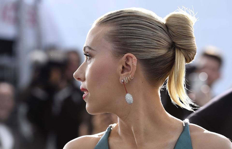<p>ScarJo is definitely our piercing muse and has rocked many a stacked ear on the red carpet. We especially love this chic multiple ring and stud look. </p>