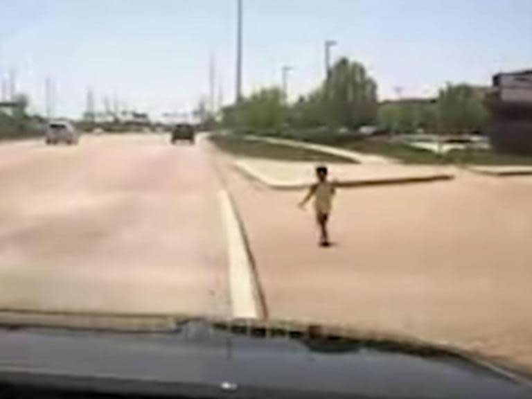 Hero police officer honoured after saving toddler who ran into busy highway traffic