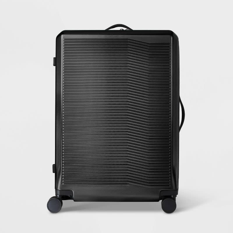 <p><a href="https://go.redirectingat.com?id=74968X1596630&url=https%3A%2F%2Fwww.target.com%2Fp%2Fhardside-large-checked-spinner-suitcase-open-story%2F-%2FA-79295292&sref=https%3A%2F%2Fwww.goodhousekeeping.com%2Ftravel-products%2Fa41994418%2Fbest-travel-gear%2F" rel="nofollow noopener" target="_blank" data-ylk="slk:Shop Now;elm:context_link;itc:0;sec:content-canvas" class="link ">Shop Now</a></p><p>Hardside Luggage Large Checked Spinner Suitcase</p><p>$209.99</p><p>target.com</p><span class="copyright">Open Story</span>