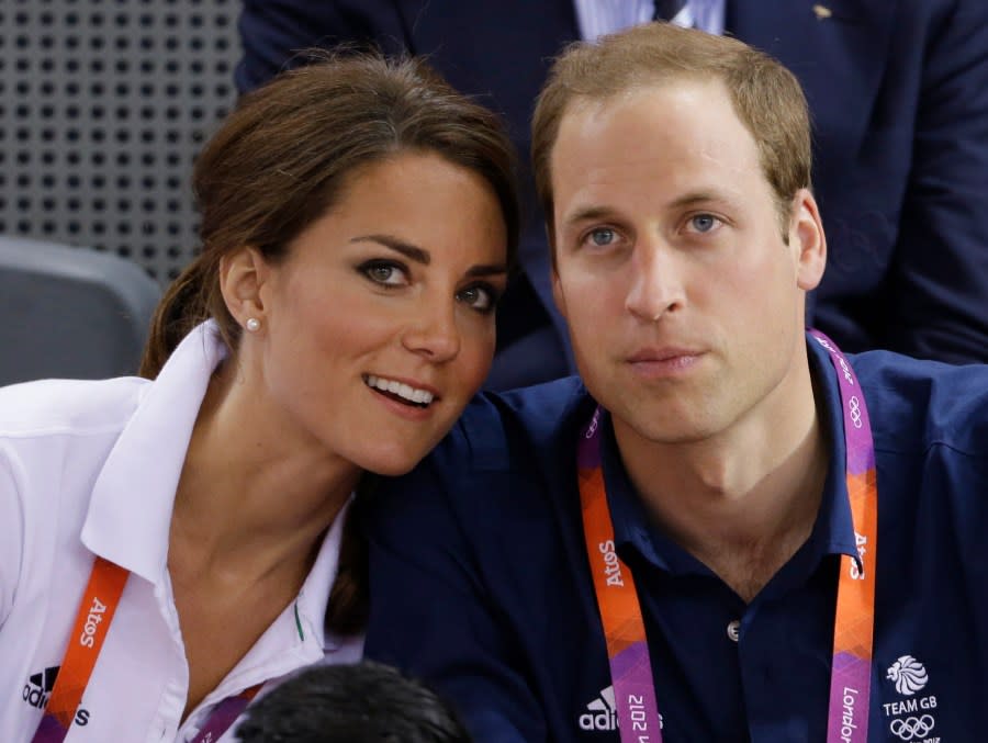 FILE – Prince William, right, and wife Kate, Duke and Duchess of Cambridge, watch track cycling at the velodrome during the 2012 Summer Olympics, Thursday, Aug. 2, 2012, in London. (AP Photo/Matt Rourke, File)