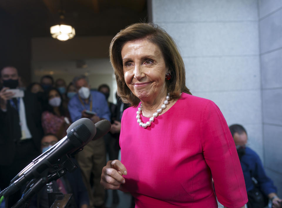 House Speaker Nancy Pelosi, D-Calif., updates reporters following a Democratic Caucus meeting in the basement of the Capitol in Washington, Tuesday, Sept. 28, 2021. Work continues behind the scenes on President Joe Biden's domestic agenda and a bill to fund the the government. (AP Photo/J. Scott Applewhite)