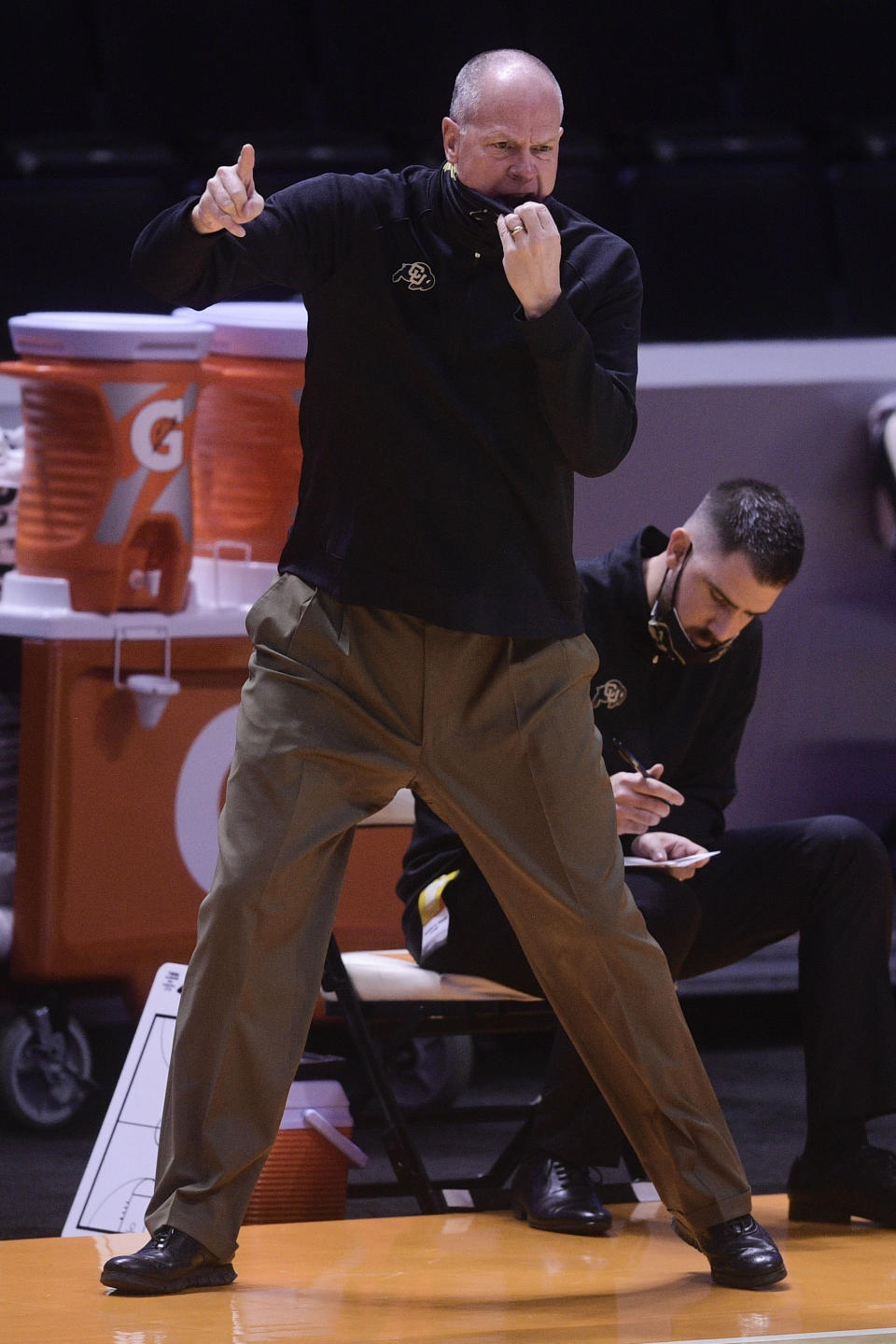 Colorado coach Tad Boyle calls from the sideline during the team's NCAA college basketball game against Tennessee on Tuesday, Dec. 8, 2020, in Knoxville, Tenn. (Caitie McMekin/Knoxville New-Sentinel via AP)