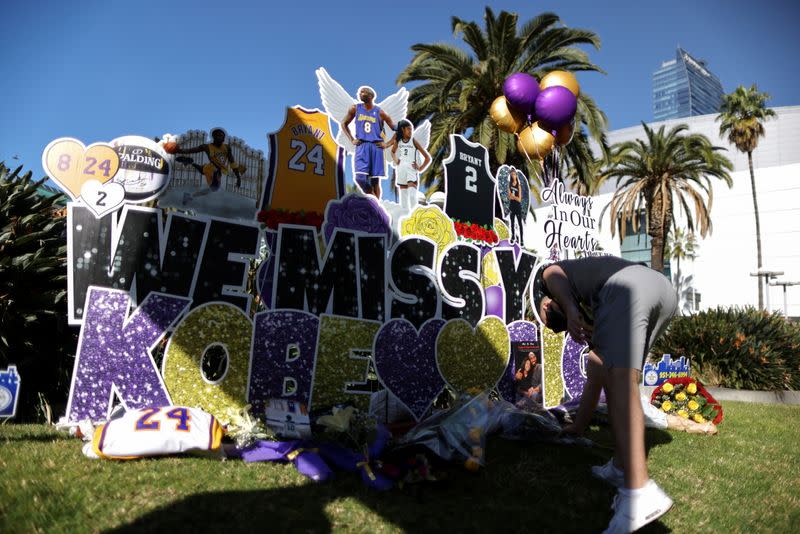 Kobe Bryant's fans gather at a memorial outside the Staples Center in Los Angeles