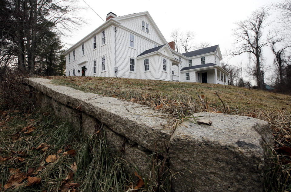 In this Thursday, Dec. 13, 2018 photo a wall stands near the home where Sarah Clayes lived, in Framingham, Mass., after leaving Salem, Mass., following the 1692 witch trials. Clayes was jailed during the witch trials but was freed in 1693 when the hysteria died down. (AP Photo/Steven Senne)