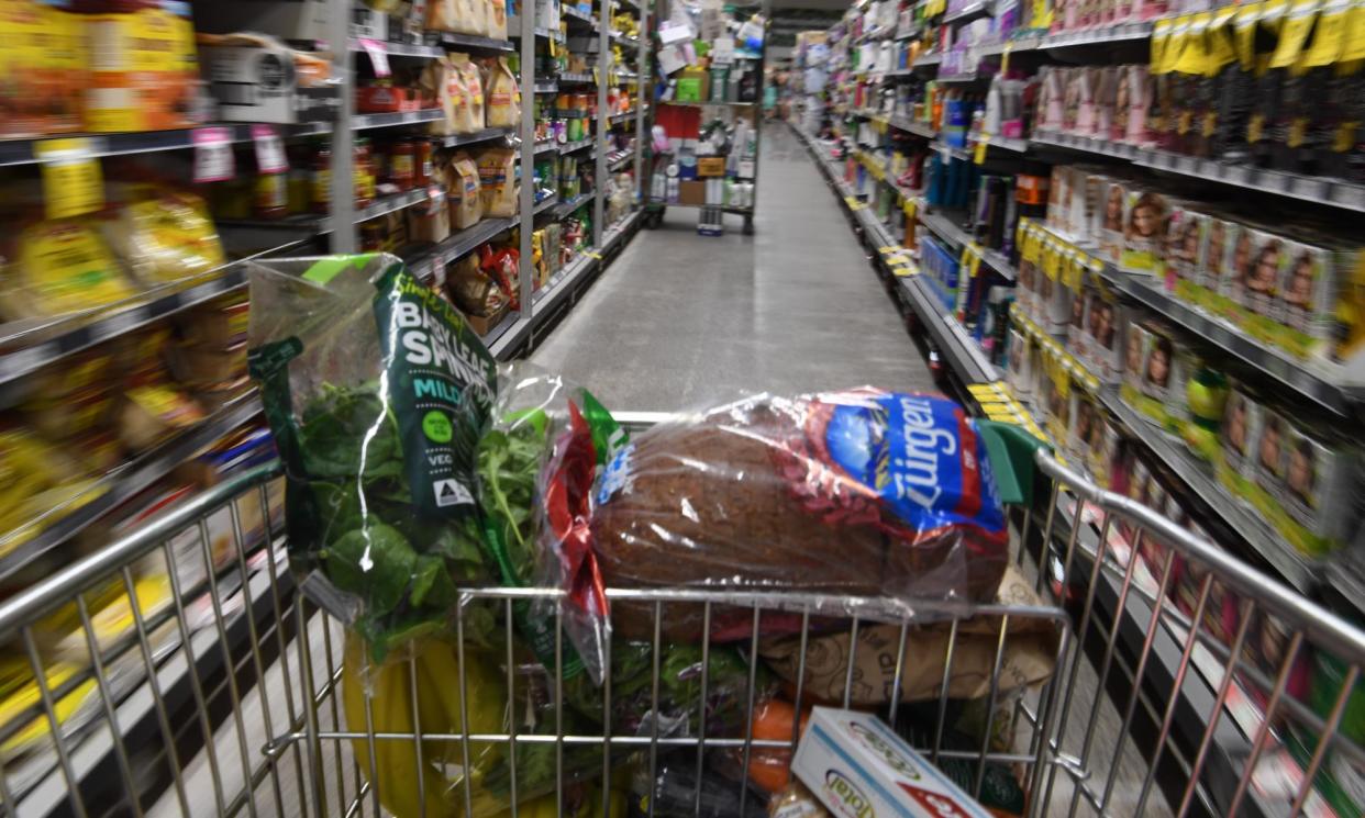 <span>Report recommends mandatory code apply to all supermarkets with annual revenues exceeding $5bn, which includes Coles, Woolworths and Aldi.</span><span>Photograph: Sam Mooy/AAP</span>