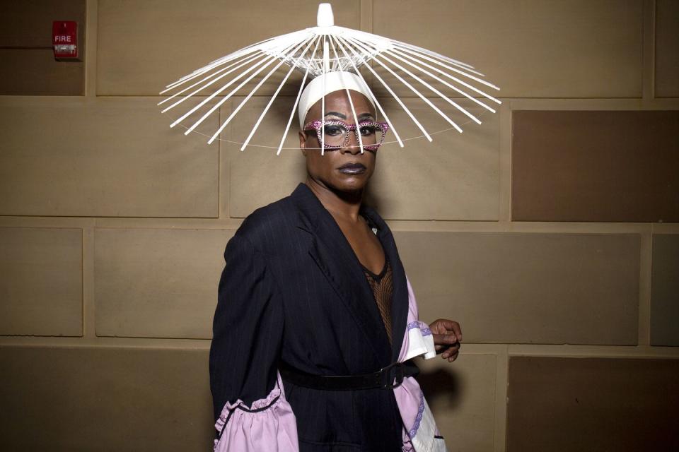 <p>Walking through Gotham Hall in New York City, Porter stunned in a custom up-cycled jacket with lavender-hued cuffs by Fountain Head NYC, trousers by Frank de Bouge and a white hat by Heidilee.</p>