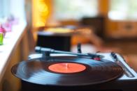 <p>Get those discs spinning by picking out each of your favorite records that will become the soundtrack for a throwback evening. Maybe some of these <a href="https://www.countryliving.com/life/entertainment/a24410934/best-country-love-songs/" rel="nofollow noopener" target="_blank" data-ylk="slk:best country love songs;elm:context_link;itc:0;sec:content-canvas" class="link ">best country love songs</a> will make it on your list.</p><p><a class="link " href="https://www.amazon.com/ByronStatics-Turntable-Speakers-Replacement-Supports/dp/B07JL2NDSQ/ref=sr_1_8?crid=5THOGD51QLQB&keywords=record+player&qid=1642693474&s=electronics&sprefix=record+player%2Celectronics%2C80&sr=1-8&tag=syn-yahoo-20&ascsubtag=%5Bartid%7C10050.g.30445302%5Bsrc%7Cyahoo-us" rel="nofollow noopener" target="_blank" data-ylk="slk:SHOP RECORD PLAYERS;elm:context_link;itc:0;sec:content-canvas">SHOP RECORD PLAYERS</a></p>