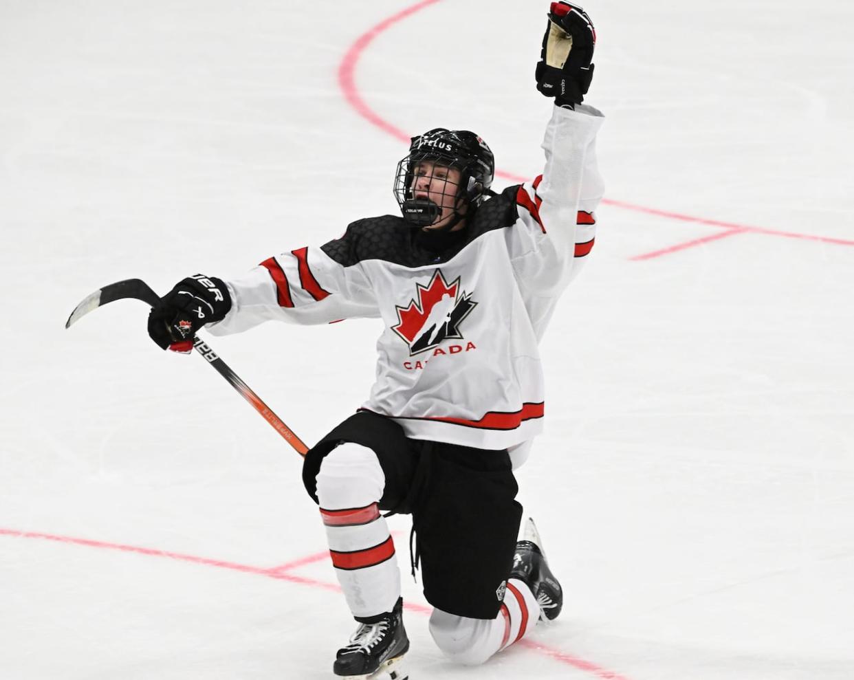 Whitehorse's Gavin McKenna celebrates his 4-6 empty net goal and hattrick during the 2024 U18 men's hockey world championships final match between the U.S. and Canada in Espoo, Finland, last Sunday. (Jussi Nukari/Lehtikuva/AP - image credit)