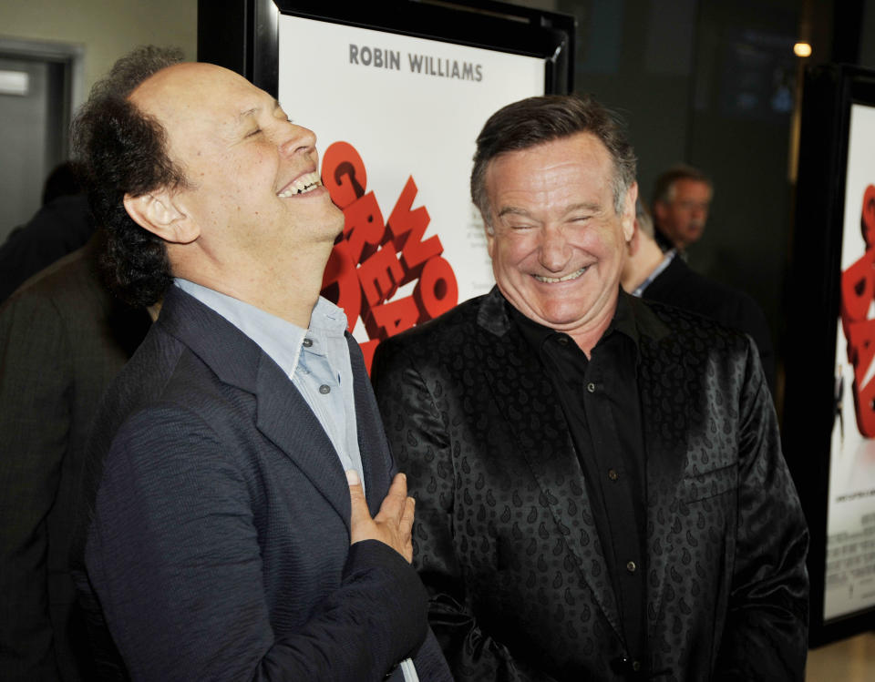 Actors Billy Crystal (left) and Robin Williams at the premiere of Magnolia Pictures' "World's Greatest Dad" on Aug. 13, 2009, in Los Angeles. (Photo: Kevin Winter via Getty Images)