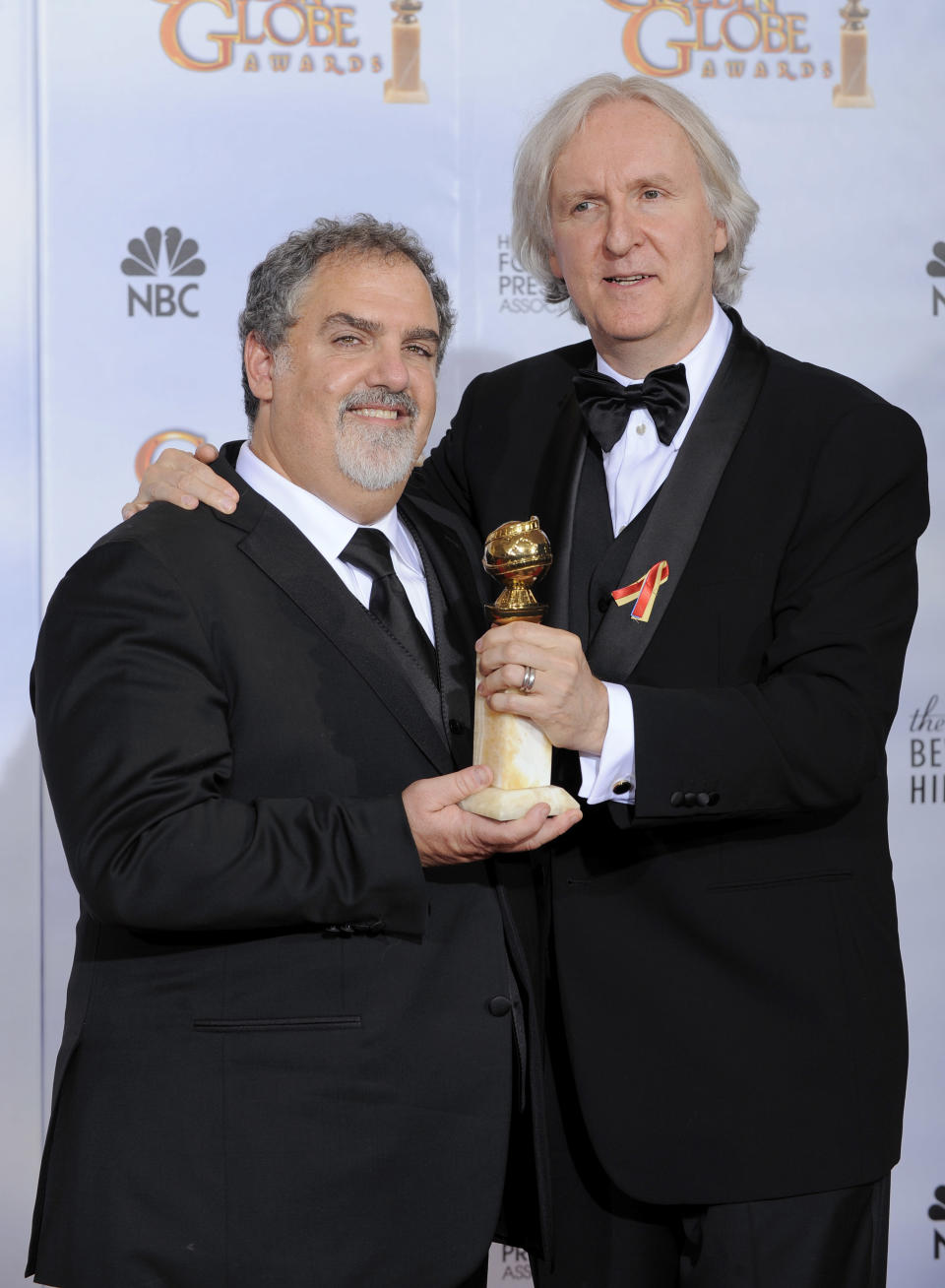 Producer Jon Landau, left, and director James Cameron pose with the award for best motion picture drama for “Avatar” backstage at the 67th Annual Golden Globe Awards on Sunday, Jan. 17, 2010, in Beverly Hills, Calif. (AP Photo/Mark J. Terrill)