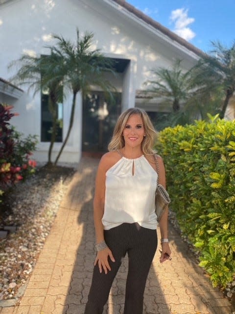 Lisa Sklar outside her new home in Boca Raton, Florida. Sklar moved from Chappaqua, New York to Florida during the pandemic.