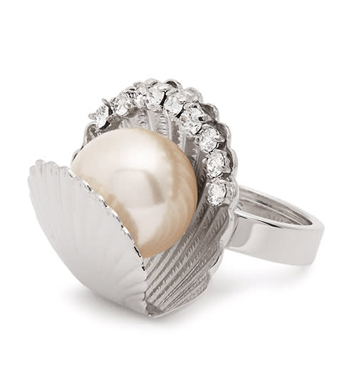 <p><strong>Miu Miu</strong> ring, $345, matchesfashion.com</p><p><a rel="nofollow noopener" href="https://www.matchesfashion.com/us/products/Miu-Miu-Shell-faux-pearl-embellished-ring--1153293" target="_blank" data-ylk="slk:BUY NOW;elm:context_link;itc:0;sec:content-canvas" class="link ">BUY NOW</a><br></p>
