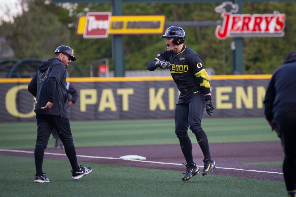 Oregon outfielder Bryce Boettcher rallies the crowd after hitting a home run as the Oregon Ducks host the Oregon State Beavers Tuesday, April 30, 2024, at PK Park in Eugene, Ore.