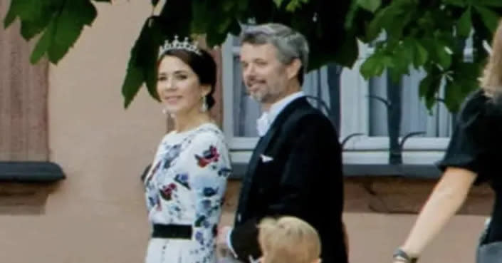 Princess Mary and Prince Frederik attend a wedding. 