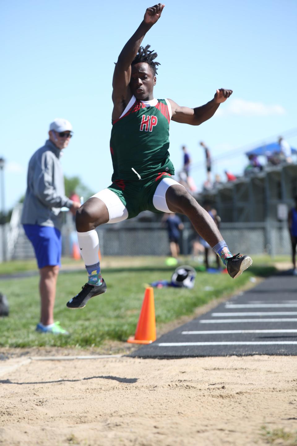 Highland Park's Tre Richardson won regional titles in the 100, 200, long jump and triple jump.