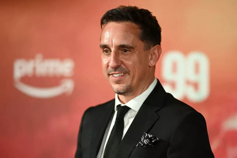 Former Manchester United footballer Gary Neville poses