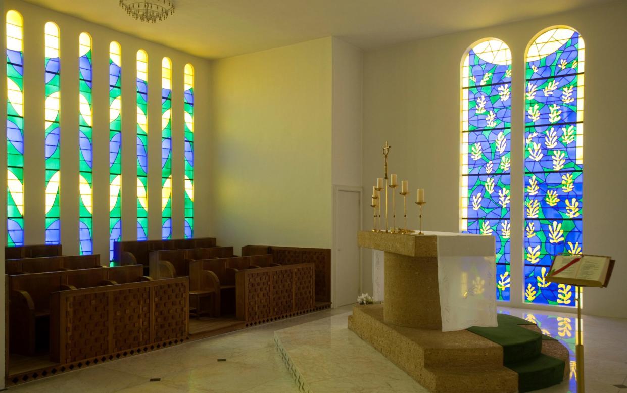 The offset altar in front of the Tree of Life window