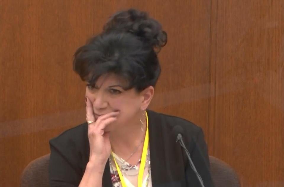 In this image from video, former paramedic Michelle Moseng testifies as Hennepin County Judge Peter Cahill presides, Tuesday, April 13, 2021, in the trial of former Minneapolis police Officer Derek Chauvin at the Hennepin County Courthouse in Minneapolis, Minn.  Chauvin is charged in the May 25, 2020 death of George Floyd.