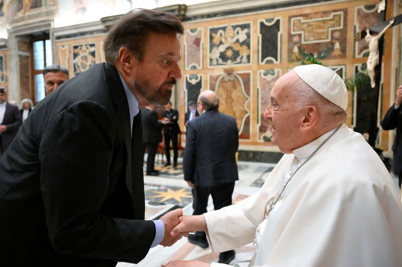 Pope Francis meets with comedians during a cultural event at the Vatican