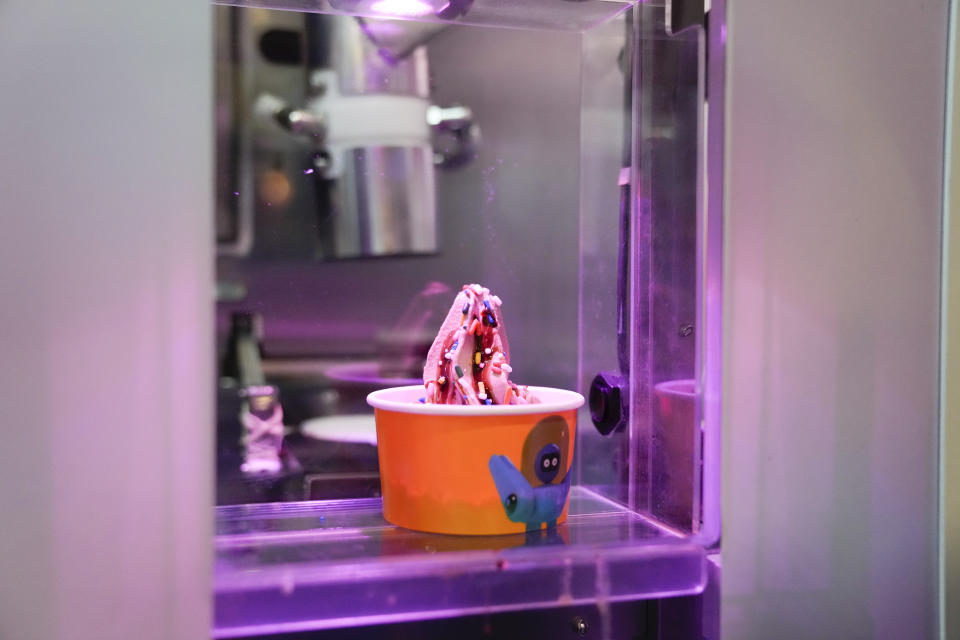 A finished order of ice cream created by the ice cream robot by Sweet Robo is displayed during a demonstration at the CES tech show Wednesday, Jan. 10, 2024, in Las Vegas. (AP Photo/Ryan Sun)