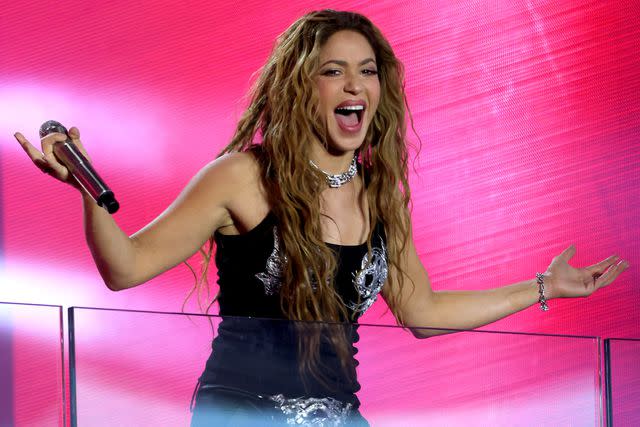 <p>Kevin Mazur/Getty</p> Shakira performs in Times Square in New York City on March 26, 2024