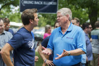 UNITED STATES - AUGUST 14: Rep. Aaron Schock, R-Ill., left, talks with Jim Oberwies, Republican senate candidate for Illinois, during Republican Day at the Illinois State Fair in Springfield, Ill., August 14, 2014. (Photo By Tom Williams/CQ Roll Call)