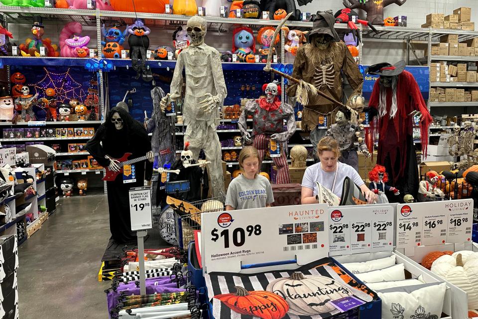 People browse Halloween decorations at Lowe's Home Improvement hardware store in East Rutherford, New Jersey, on Aug. 30, 2023.