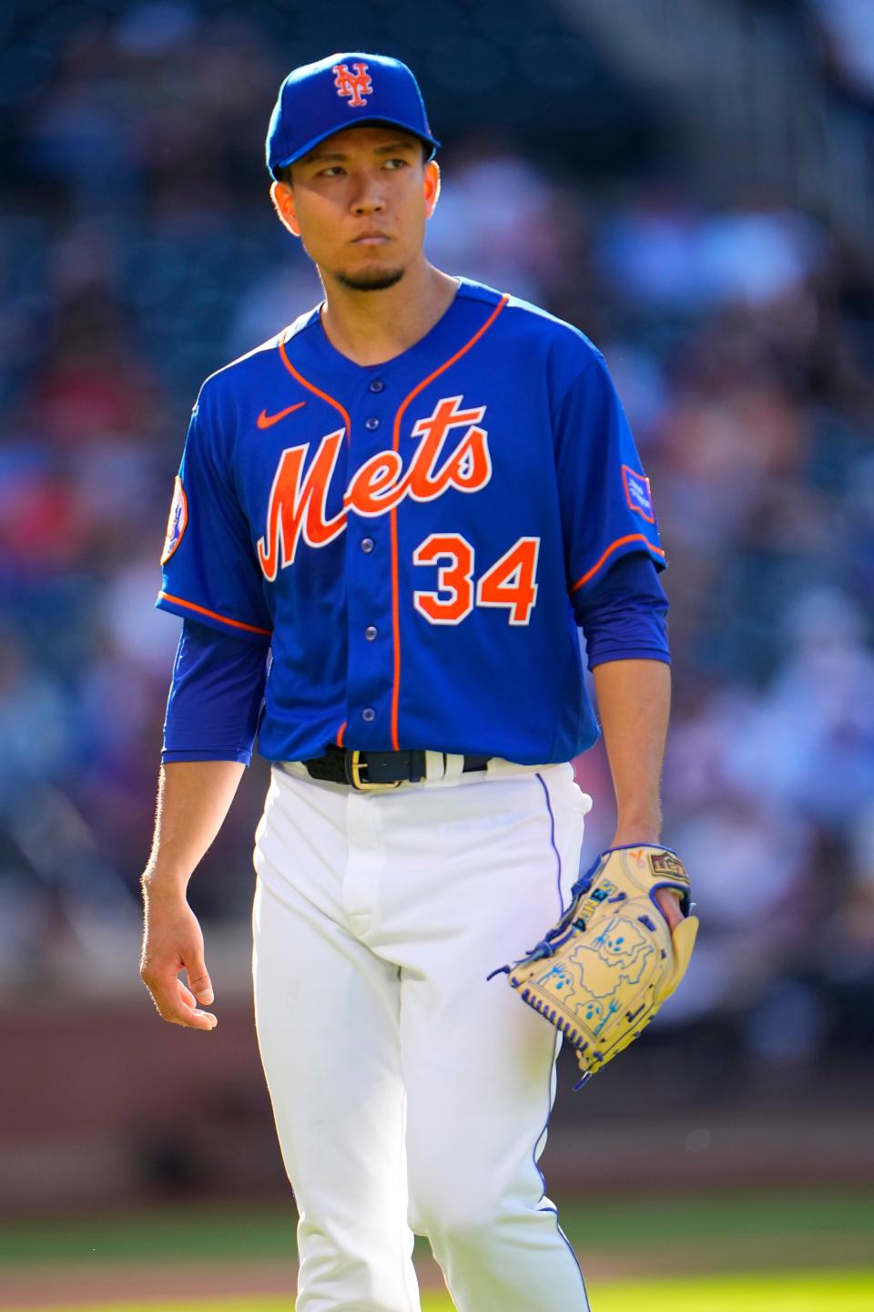 Sep 14, 2023; New York City, New York, USA; New York Mets pitcher Kodai Senga (34) walks to the dugout during the middle of the third inning against the Arizona Diamondbacks at Citi Field. Mandatory Credit: Gregory Fisher-USA TODAY Sports