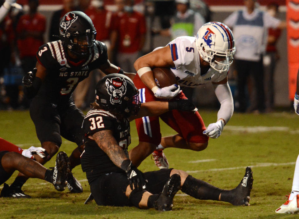 Oct 2, 2021; Raleigh, North Carolina, USA; Louisiana Tech Bulldogs receiver Griffin Hebert (5) runs after a catch during the second half against the North Carolina State Wolfpack at Carter-Finley Stadium. Mandatory Credit: Rob Kinnan-USA TODAY Sports