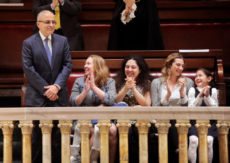 This 2017 file photo shows Rowan D. Wilson, left, standing with family and friends in the Senate gallery after the New York state Senate confirmed him to serve as an Associate Judge on the New York State Court of Appeals.