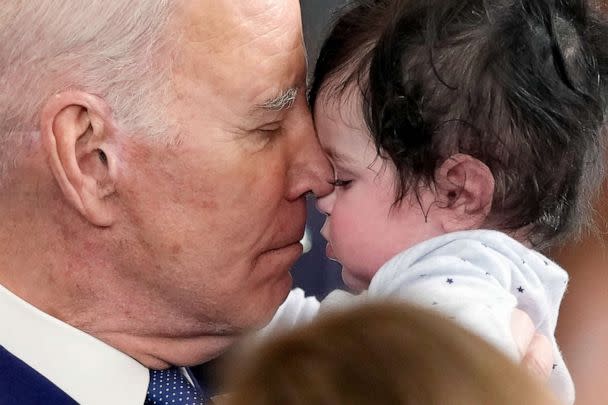 PHOTO: President Joe Biden holds the Hodge, the son of Rep. Jimmy Gomez after Biden spoke during an event in the East Room of the White House in Washington, March 23, 2023, celebrating the 13th anniversary of the Affordable Care Act. (Susan Walsh/AP)