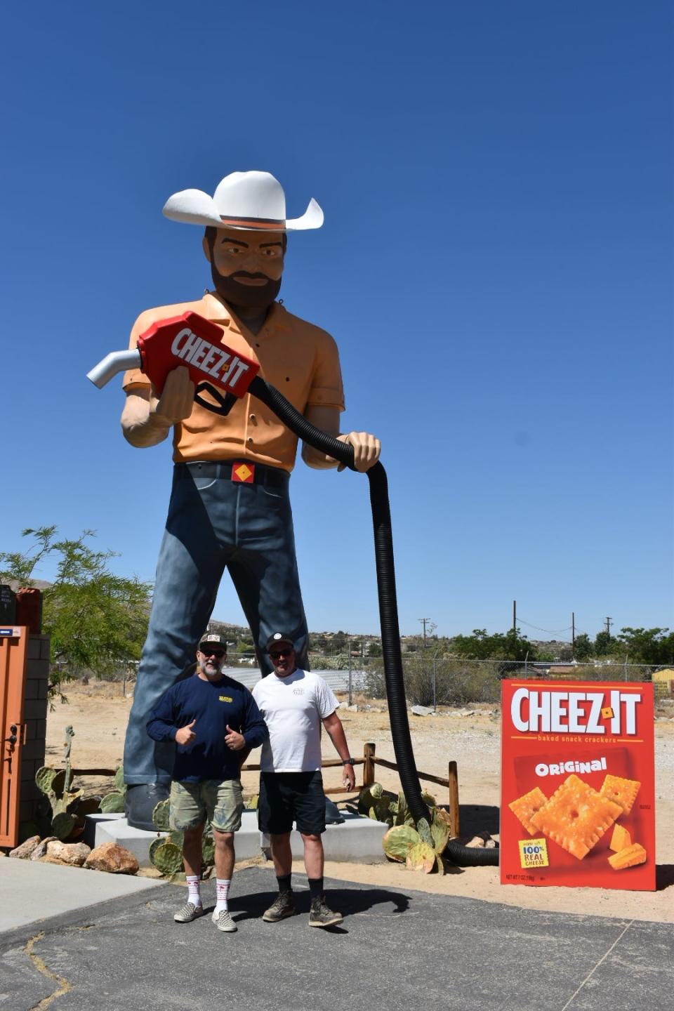 Owners of The Station, Glen Steigelman and Steve Halterman in front of Big josh-gone-Cheez-it.