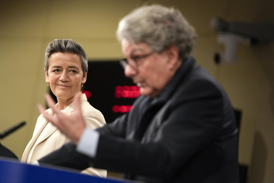 European Commissioner for Europe fit for the Digital Age, Margrethe Vestager, left, and European Commissioner for Internal Market Thierry Breton address a media conference regarding the Digital Markets Act at EU headquarters in Brussels, Monday, March 25, 2024. The European Commission on Monday opened non-compliance investigations against Alphabet, Apple and Meta under the Digital Markets Act. (AP Photo/Virginia Mayo)