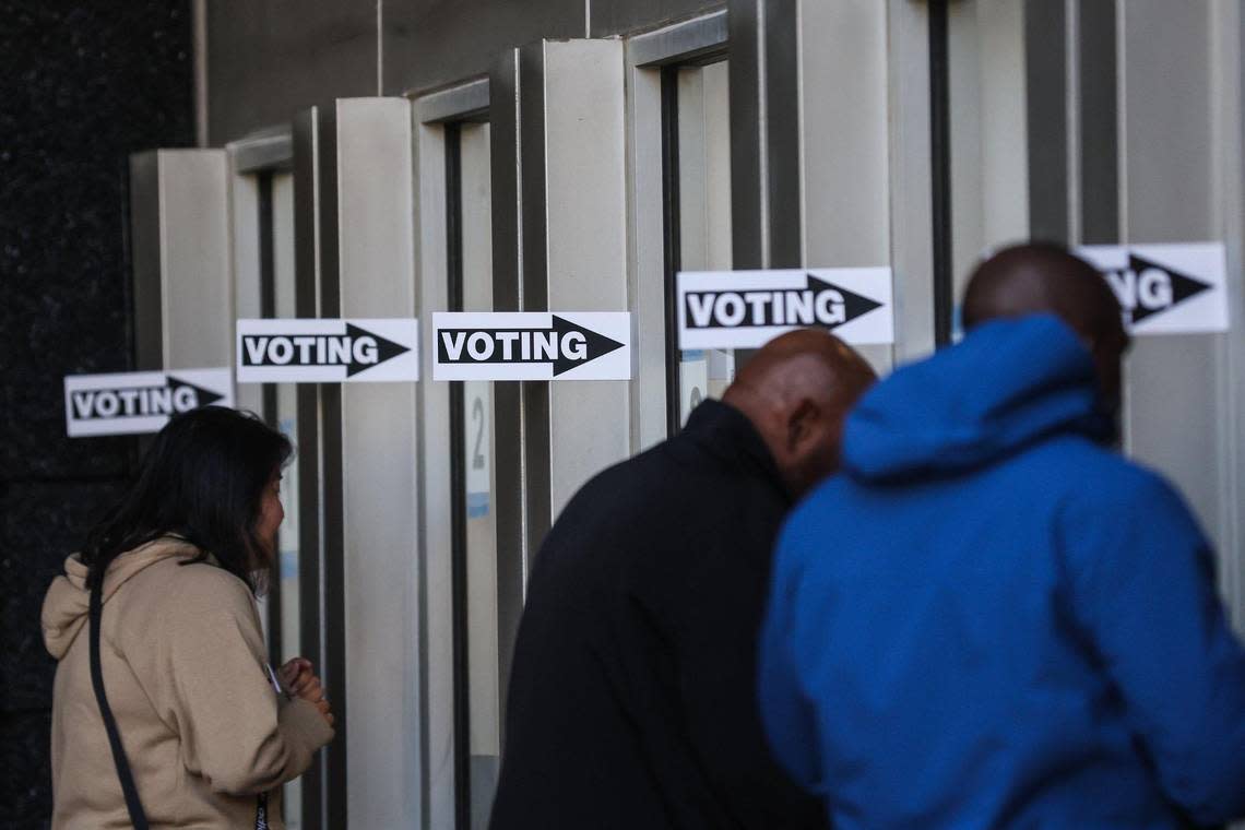 People arrive to vote early at the Bank of America Stadium voting site on Thursday, October, 20, 2022.