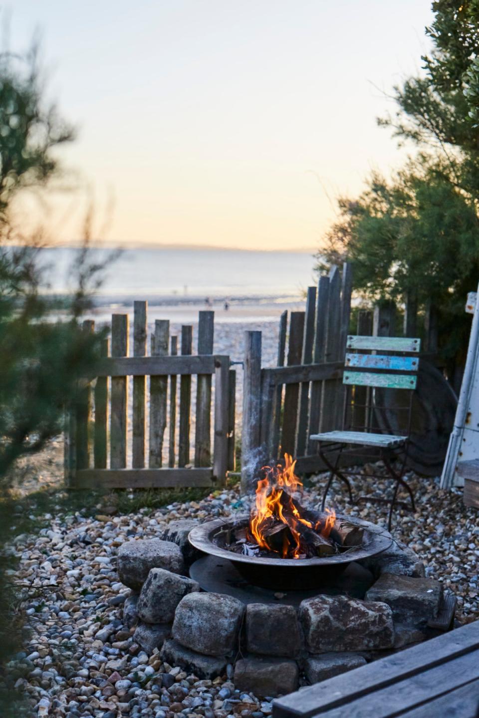 The house also has a fire pit and leads directly onto the beach (Rita Platts)