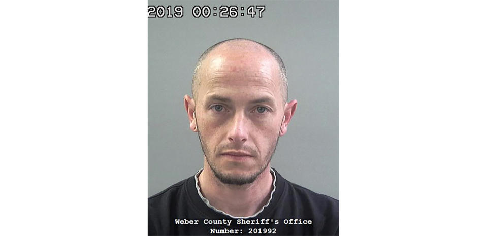 This 2019 photo provided by the Weber County Sheriff's Office shows inmate Matthew Belnap. A California man who was behind bars for bank fraud escaped from a Utah jail Tuesday night by posing as Belnap, a fellow inmate whose time had come to be released, authorities said Wednesday Feb. 26, 2020. Inmate, Kaleb Wiewandt was allowed to leave the jail in Ogden, Utah, because staff thought he was Belnap, who helped him carry out the plan, said Weber County Sheriff's Lt. Joshua Marigoni. Belnap who supposed to be freed Tuesday night after spending more than 70 days in jail after pleading no contest last year to retail theft charges, he said. ( Weber County Sheriff's Office via AP)