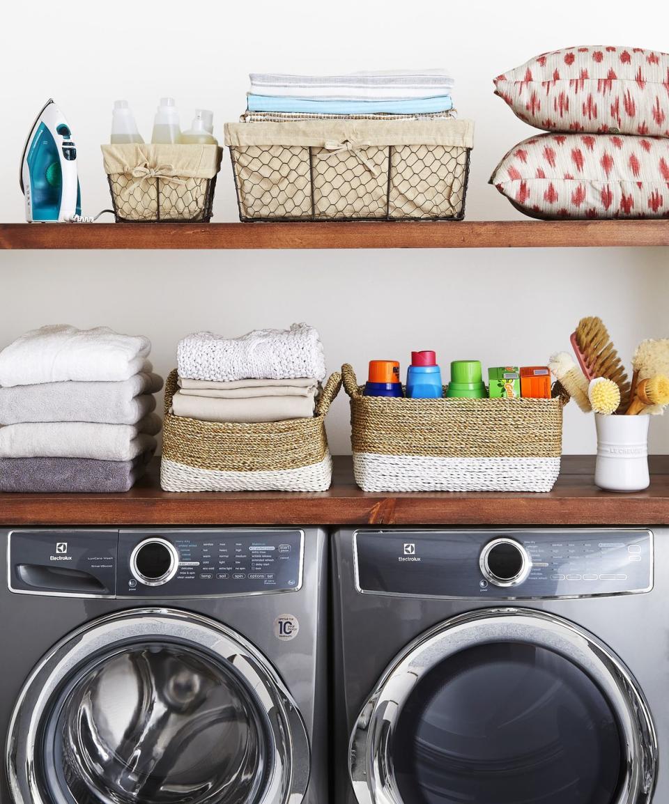 <p>More than 15,000 fires start in home laundry rooms every year, according to the <a href="https://www.nfpa.org/News-and-Research/Data-research-and-tools/US-Fire-Problem/Home-fires-involving-clothes-dryers-and-washing-machines" rel="nofollow noopener" target="_blank" data-ylk="slk:National Fire Protection Association;elm:context_link;itc:0;sec:content-canvas" class="link ">National Fire Protection Association</a>. Beyond removing the fuzz from your dryer's filter after every load, pull out hard-to-reach lint with the crevice tool on your vacuum to suck up debris. Vacuum under, around, and behind the dryer as well. <br></p>