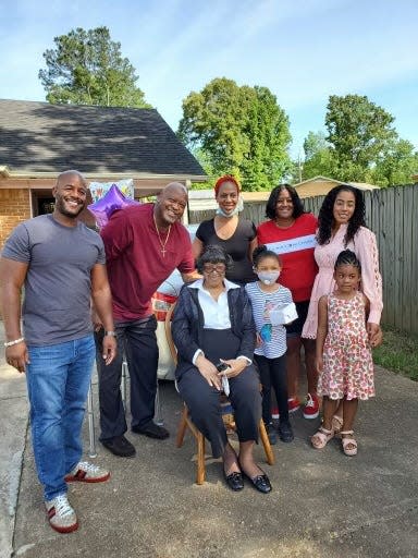 Ruth E. Tate with family members.