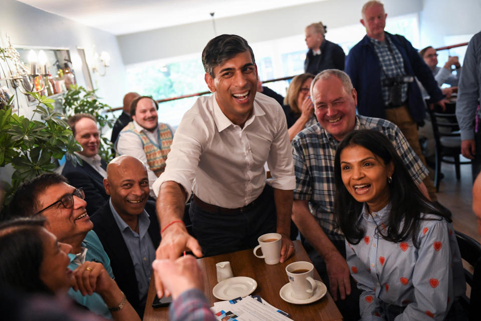 LONDON, ENGLAND - MAY 26: UK Prime Minister Rishi Sunak and his wife Akshata Murty attend a Conservative general election campaign event in Stanmore, on May 26, 2024 in London, England. Rishi Sunak has pledged to bring back Mandatory National Service for 18-year-olds if the Conservatives win the next election. (Photo by Chris J Ratcliffe - WPA Pool/Getty Images)