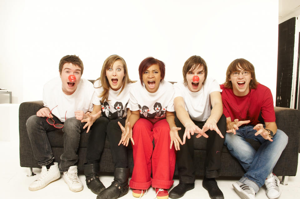 LONDON - OCTOBER 8:  The cast of the TV programme 'Skins' (From left to right; Joe Dempsie, April Pearson, Nicholas Hoult, Mike Bailey and Larissa Wilson), take part in Red Nose Day 2009, in the studio on 8 October, 2008 in London. (Photo by Comic Relief/Getty Images)